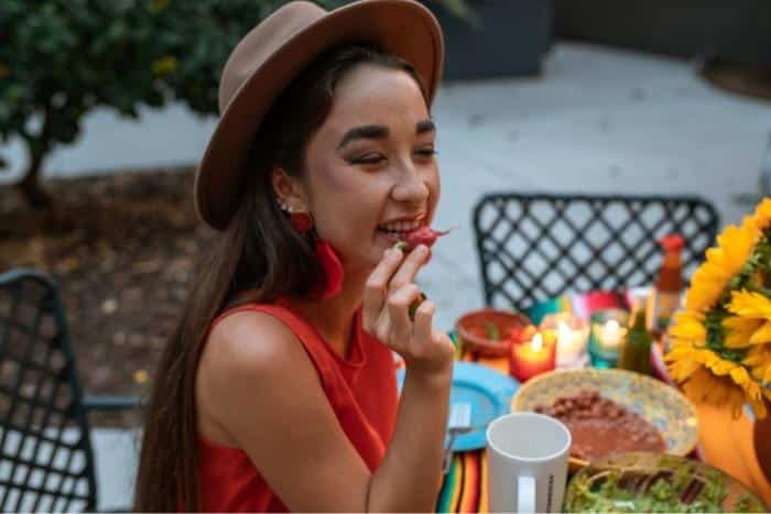 girl-eating-radish-on-a-food-tour