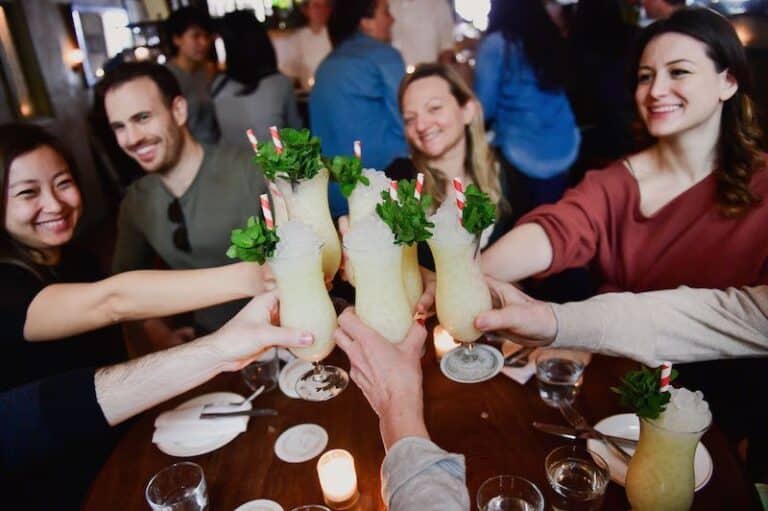 group toasting cocktail during nyc private event