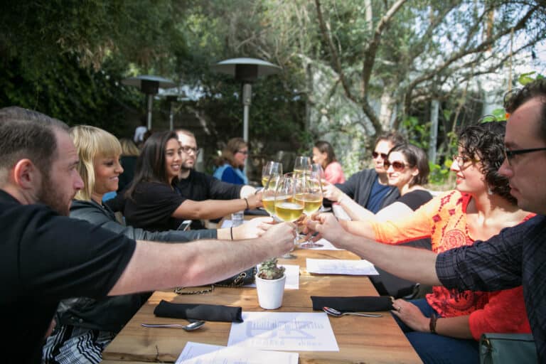 Katie-Edwards.-Venice-Beach.-Guests-cheersing-with-wine-at-Plant-Food-and-Wine on venice beach food tour