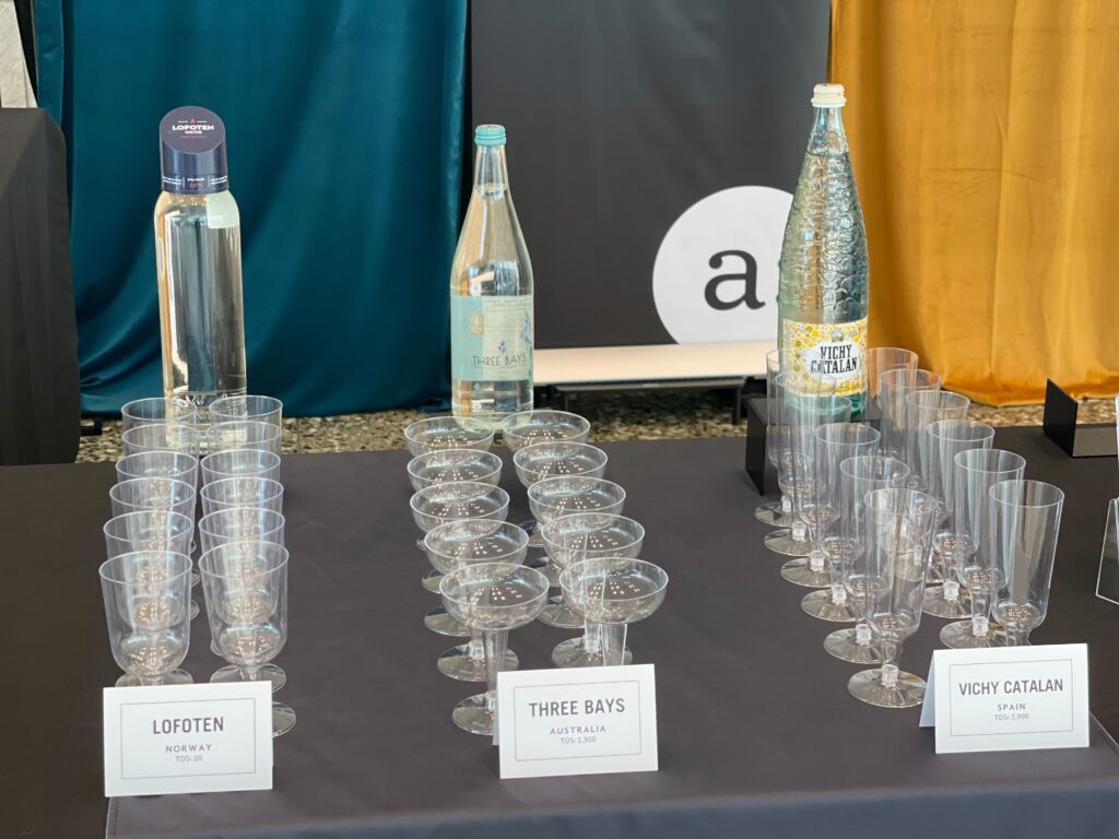 Water Bar for Flavor Perception Bar with three bottles and wine glasses