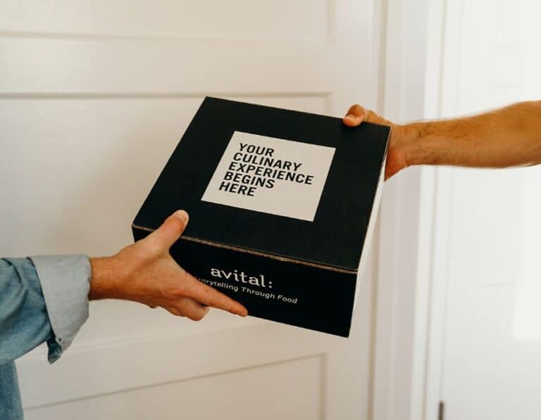 hands delivering avital experience gifts
