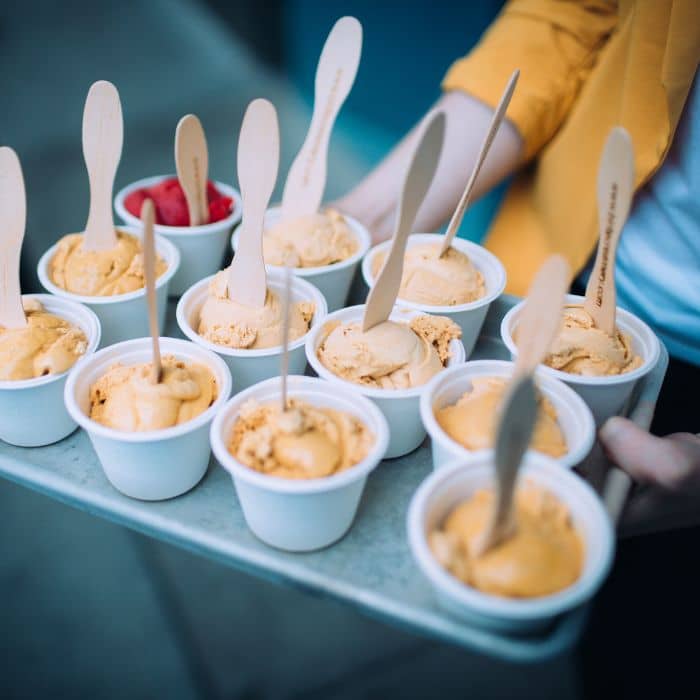 Popular salted caramel ice cream scoops in cups from Bi Rite Creamery