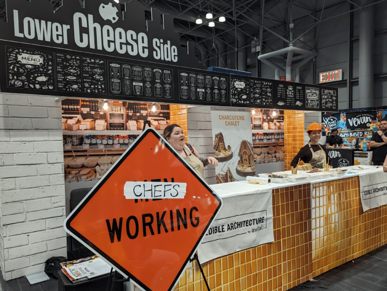 Chefs Working Construction sign before first round of charcuterie chalet showdown