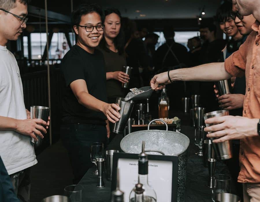 group making cocktails during private dining event