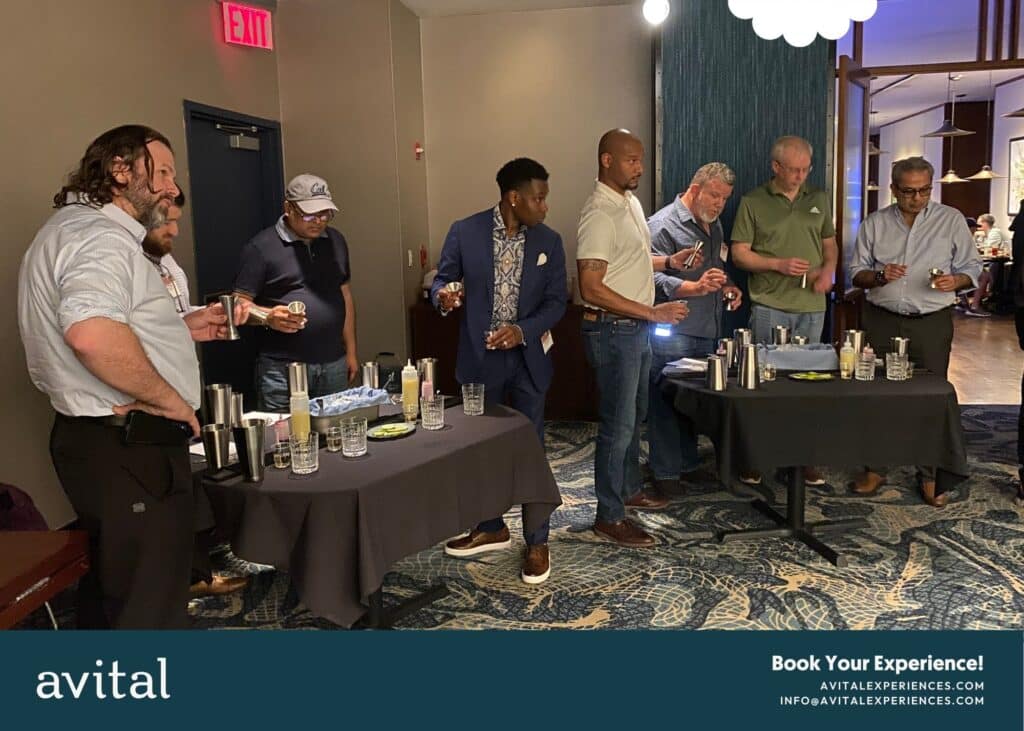 group of men learning how to make cocktails at blue fin nyc