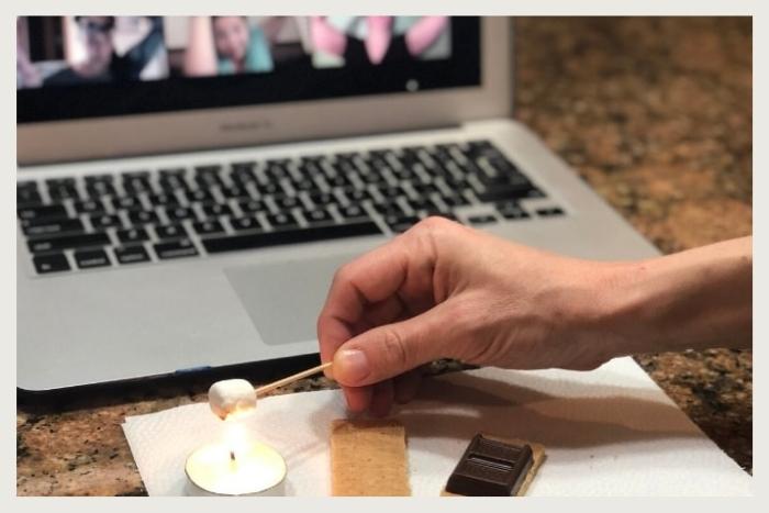 person making tiny smore during unique virtual event