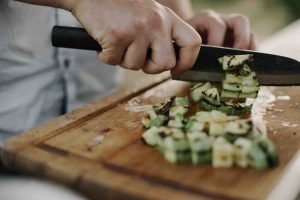 chef chopping vegetables during virtual team building