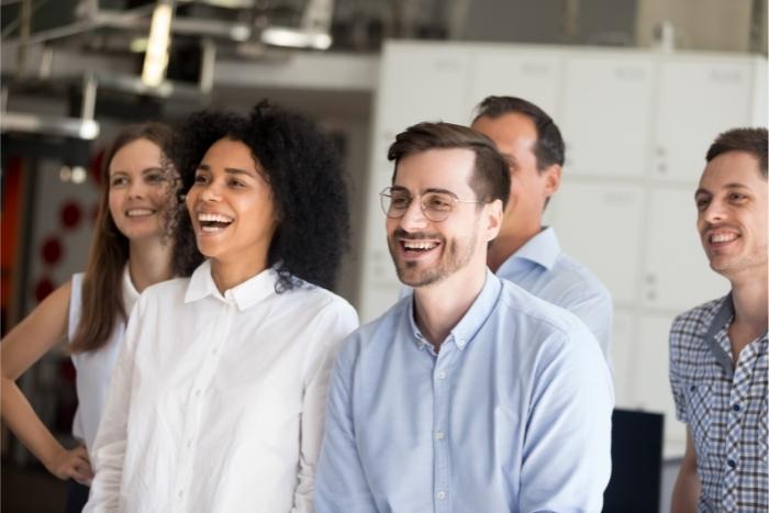 colleagues laughing during office team building in san francisco