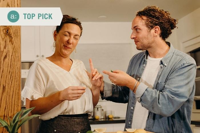 two people eating lemon and making funny face during san francisco team building activity