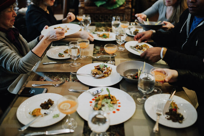 A full table on a Flatiron Food Tour: A Fun (and Filling) Team Building Activity for Coworkers