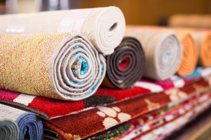 rugs-rolled-up-for-rug-making-class