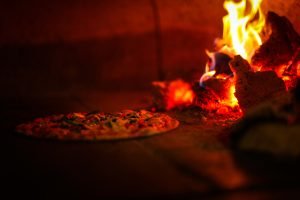 woodfired pizza at warm and cozy restaurants