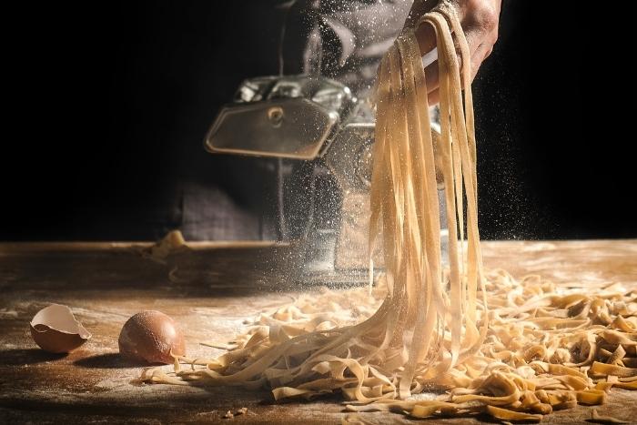 fresh-pasta-being-made-by-hand