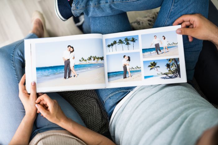 couple looking at photo album