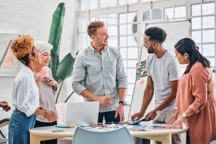 group of coworkers meeting for wellness challenge, part of healthy team building activites for work