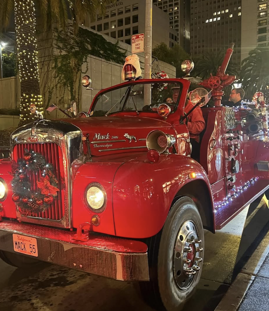 An Sf fire engine is decked out in xmas accouterment