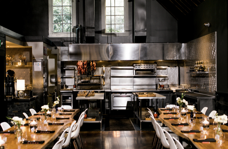 The tables are set at Lazy Bear for a dinner party