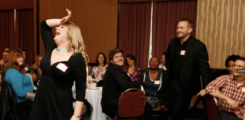 A dramatic scene takes place at the Dinner Detective show