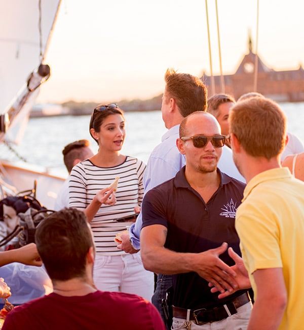 group on sail boat for nyc team building event