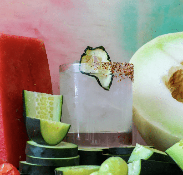 refreshing cucumber margarita cocktail with tajin salt rim made using a cocktail kit