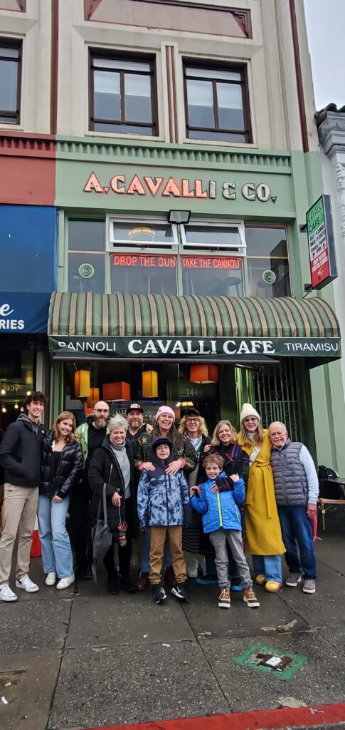group standing in front of cavalli cafe during north beach food tour