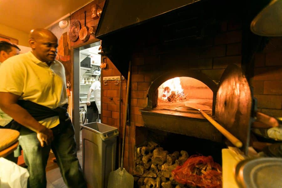 north beach food tour guest going behind the scenes to see wood fired oven