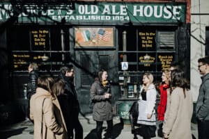 avital hosting group outside of mcsorleys ale house in nyc