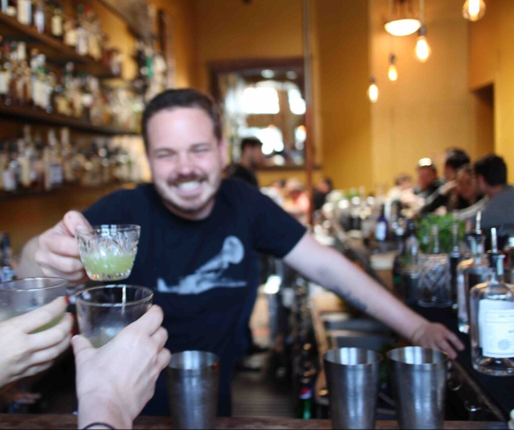 bartender toasting during bachelorette party food tours