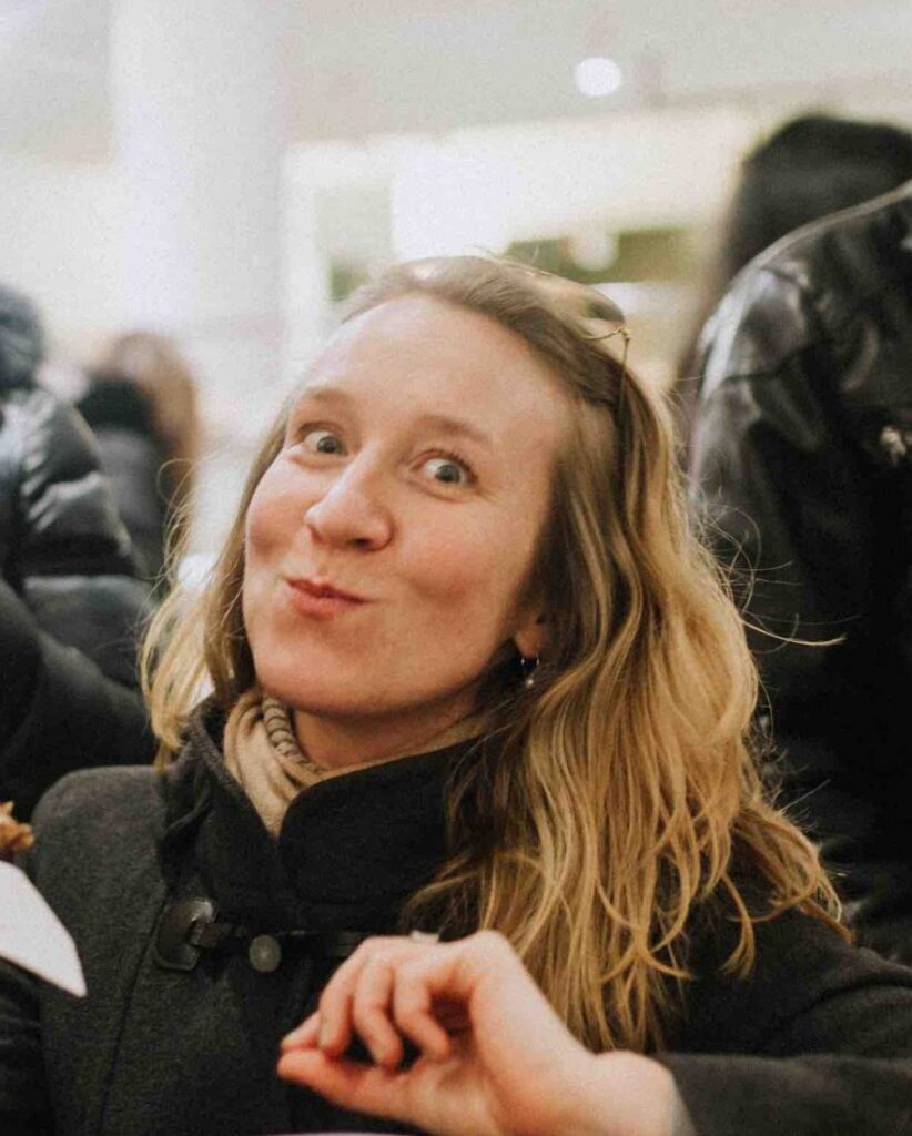 person tasting something delicious