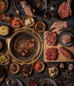 wagyu meat served at cote korean steakhouse on the grill at nyc michelin one star restaurant