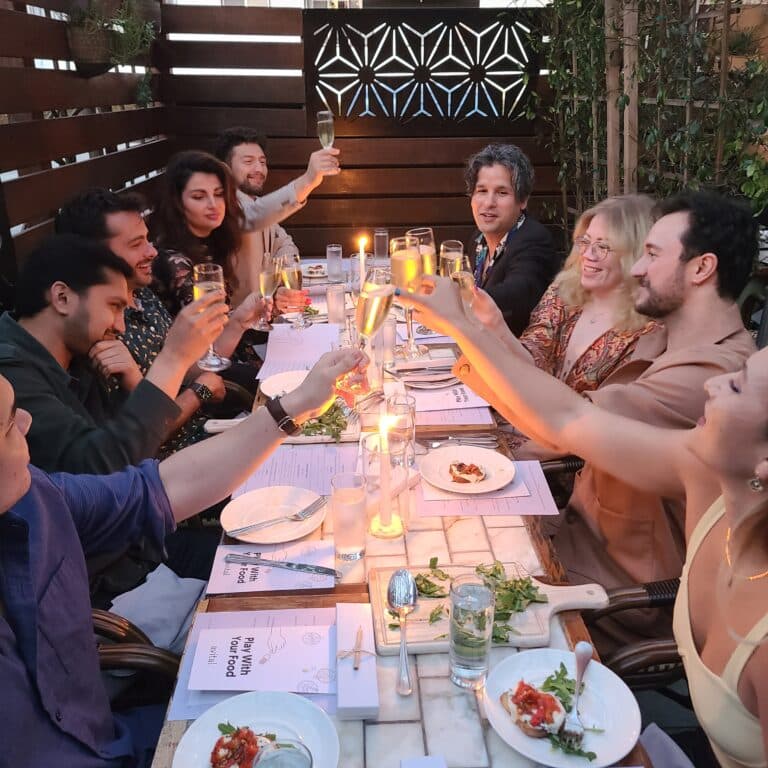 birthday party private dining meal with group cheersing at restaurant