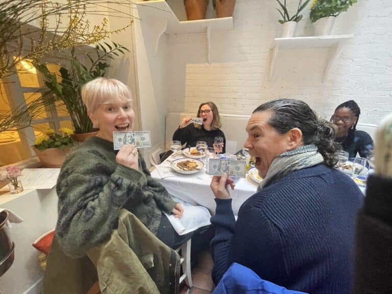 holding edible money on a nyc private dining experience