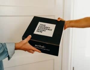 hands delivering avital experience kit