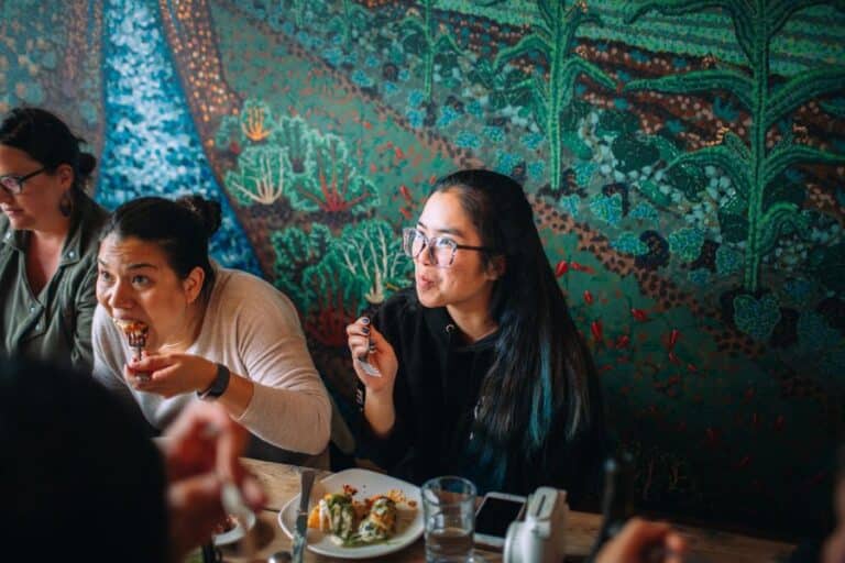 group eating mexican food during mission district food tour