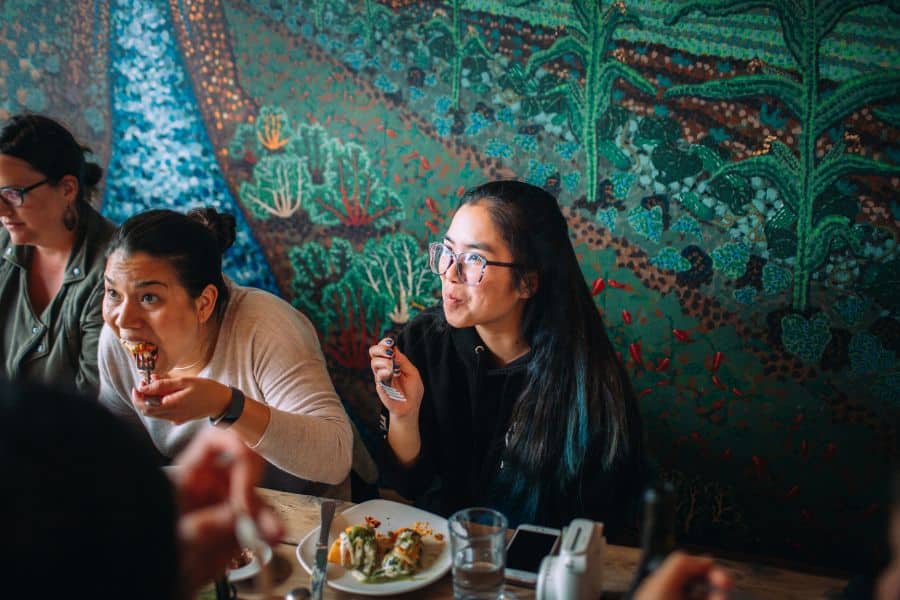 group eating mexican food during mission district food tour
