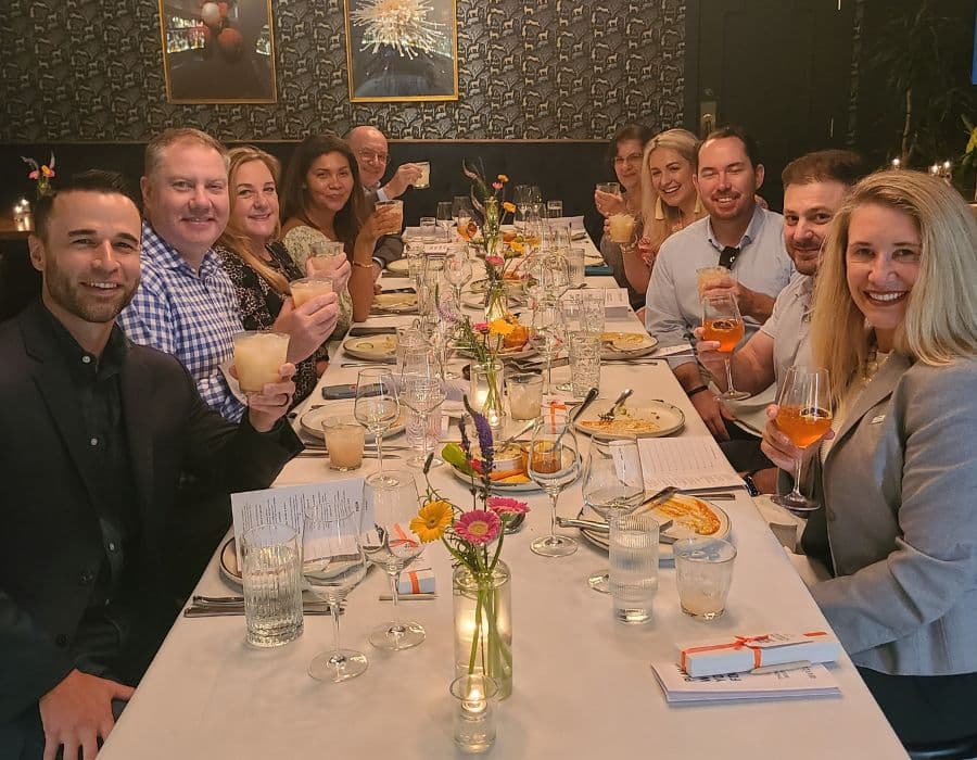 group enjoying team building event at one of best private dining rooms dallas