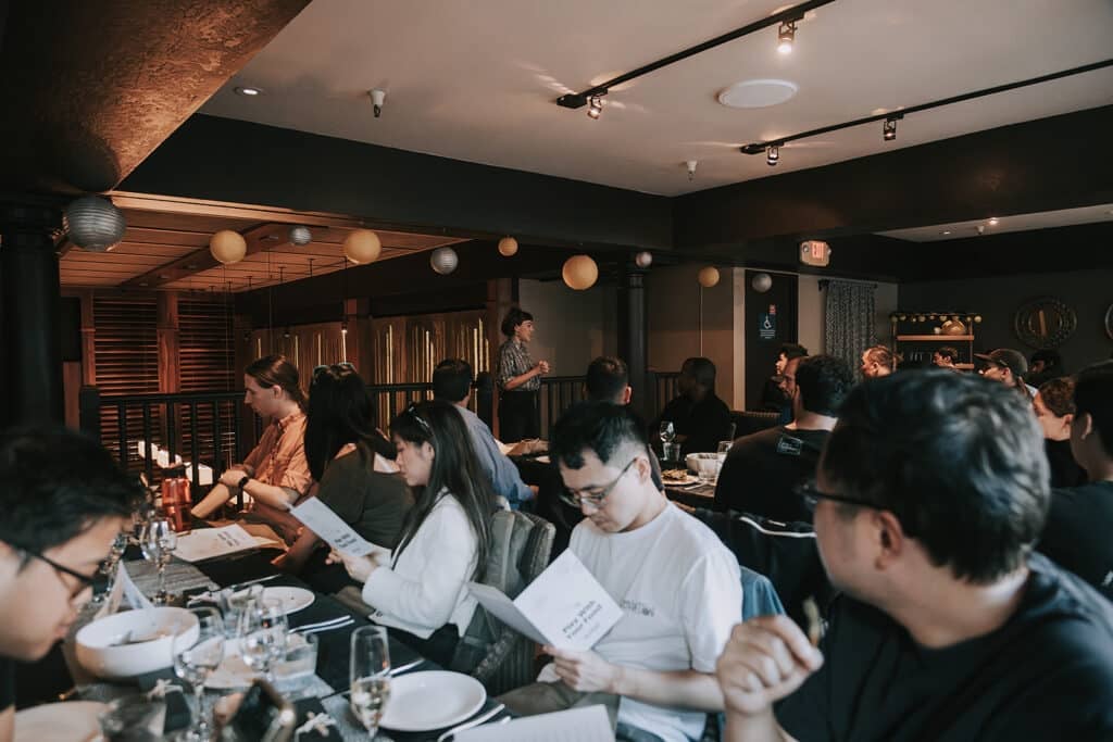 group reading avital menu during private dining event