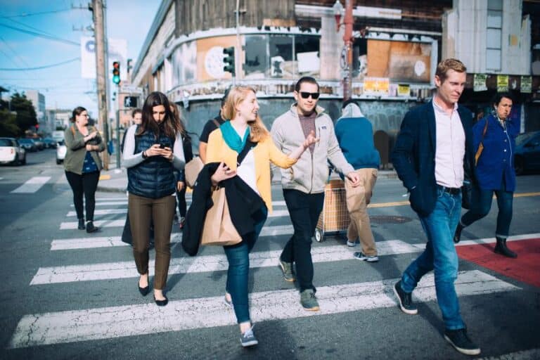 group walking across sidewalk during sf tour