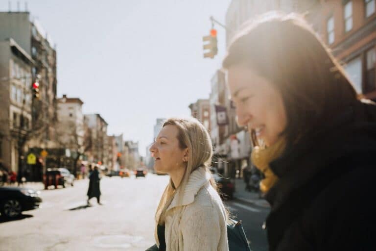 tour guide and guest walking in nyc east village