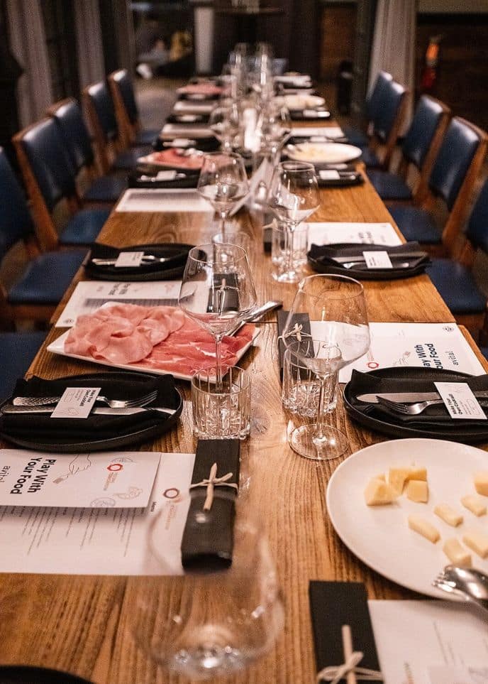 long table set for interactive meal