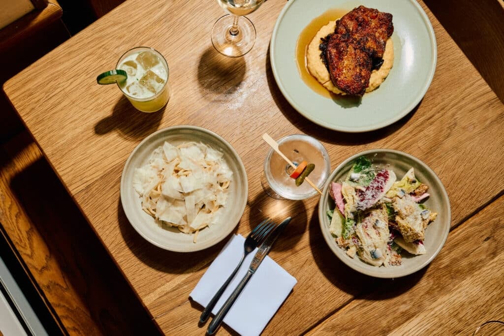 Table with food at Upland NYC