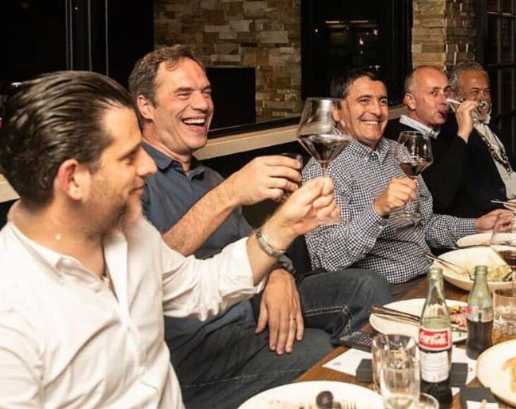 group toasting during private dining event in sf