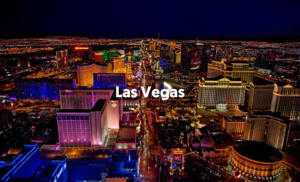 las vegas backdrop at night with words las vegas written on top