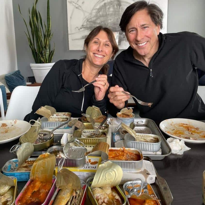 couple sampling tinned fish during comparative tasting