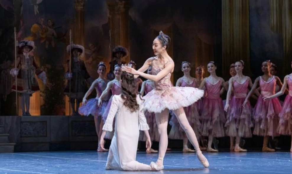 The sugar plum fairy crowns Clara in the Boston Ballet rendition of The Nutcracker