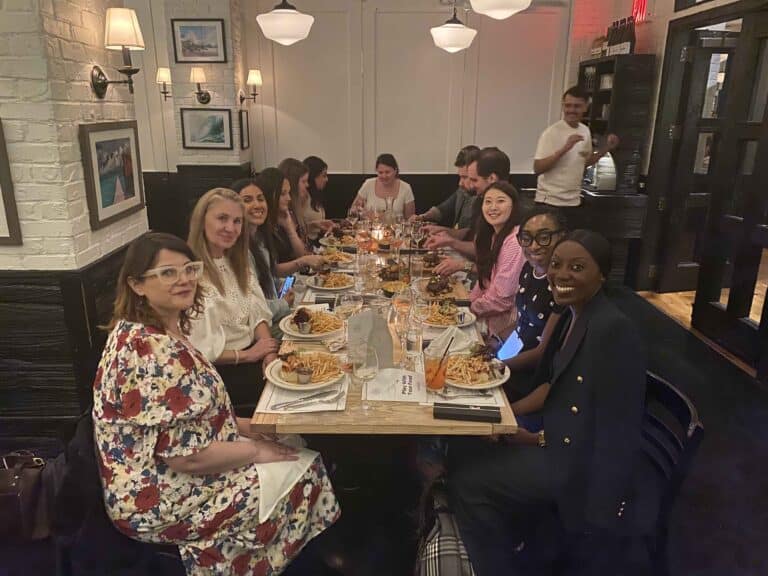 large group eating dinner during nyc interactive meal