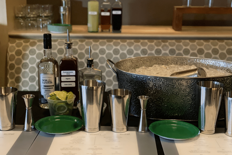 cocktail ingredients on table during cocktail bar