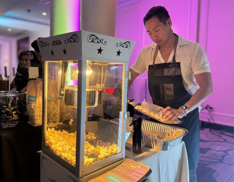 avital host scooping popcorn