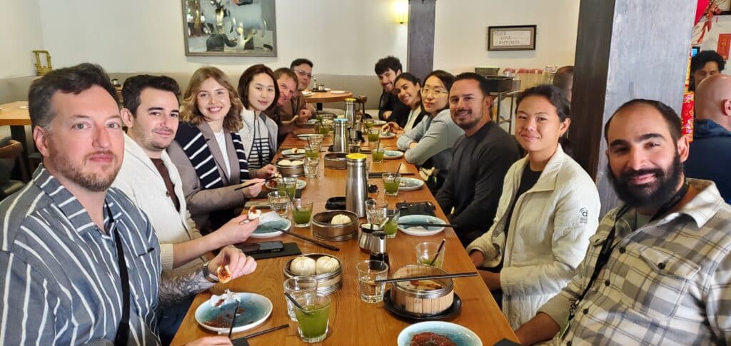 group eating dim sum during san francisco food tour chinatown