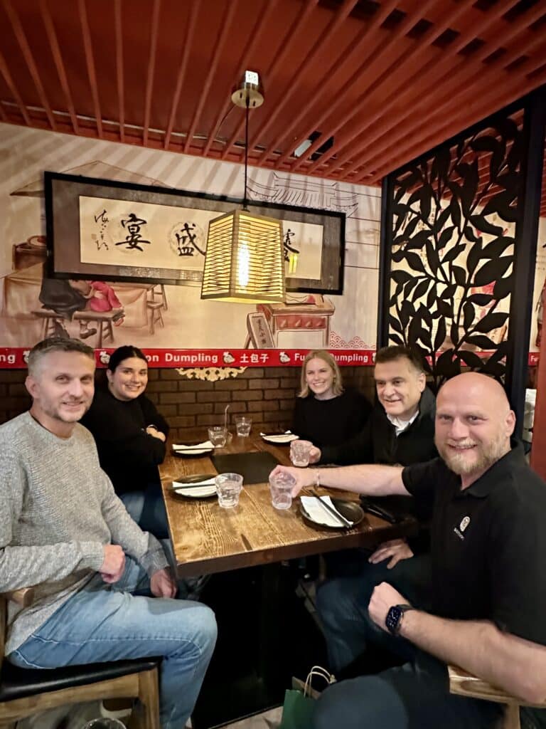 group eating during chinatown food tour with avital